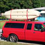 Wood and steel kayak rack build truck, kayaks and trailer loaded for cross country trip.